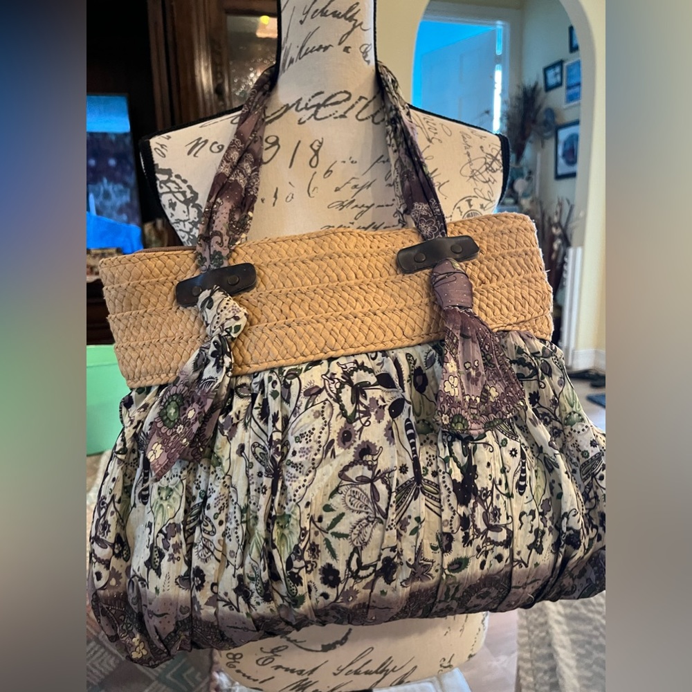 Really cute purse new great shape except for one little red spot could put a pin